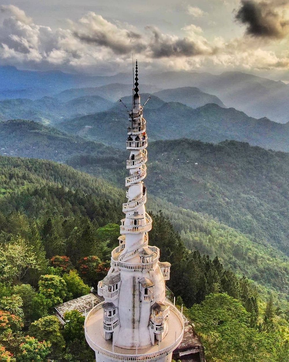 The spiralling Ambuluwawa Tower above misty mountains